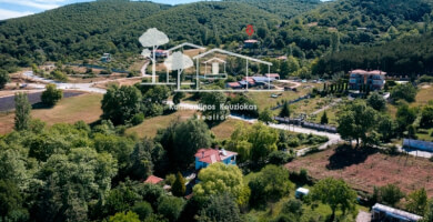 Two two-level maisonettes with basement and green yard for sale in Vavdos, Halkidiki. Photo 